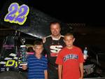 Mike in victory lane with his two sons Avery(left) and Lane(right)
